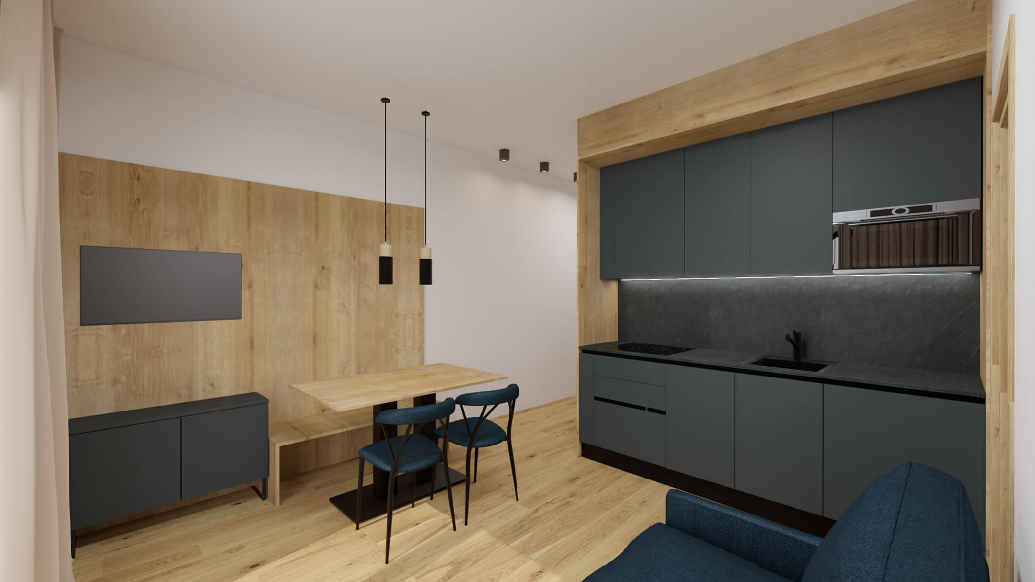 Moderne Küche im Apartment 2 mit dunkler Kochnische, Holztisch und dunkelblauen Stühlen, im Vordergrund ein dunkelblaues Sofa - sil132 apartments