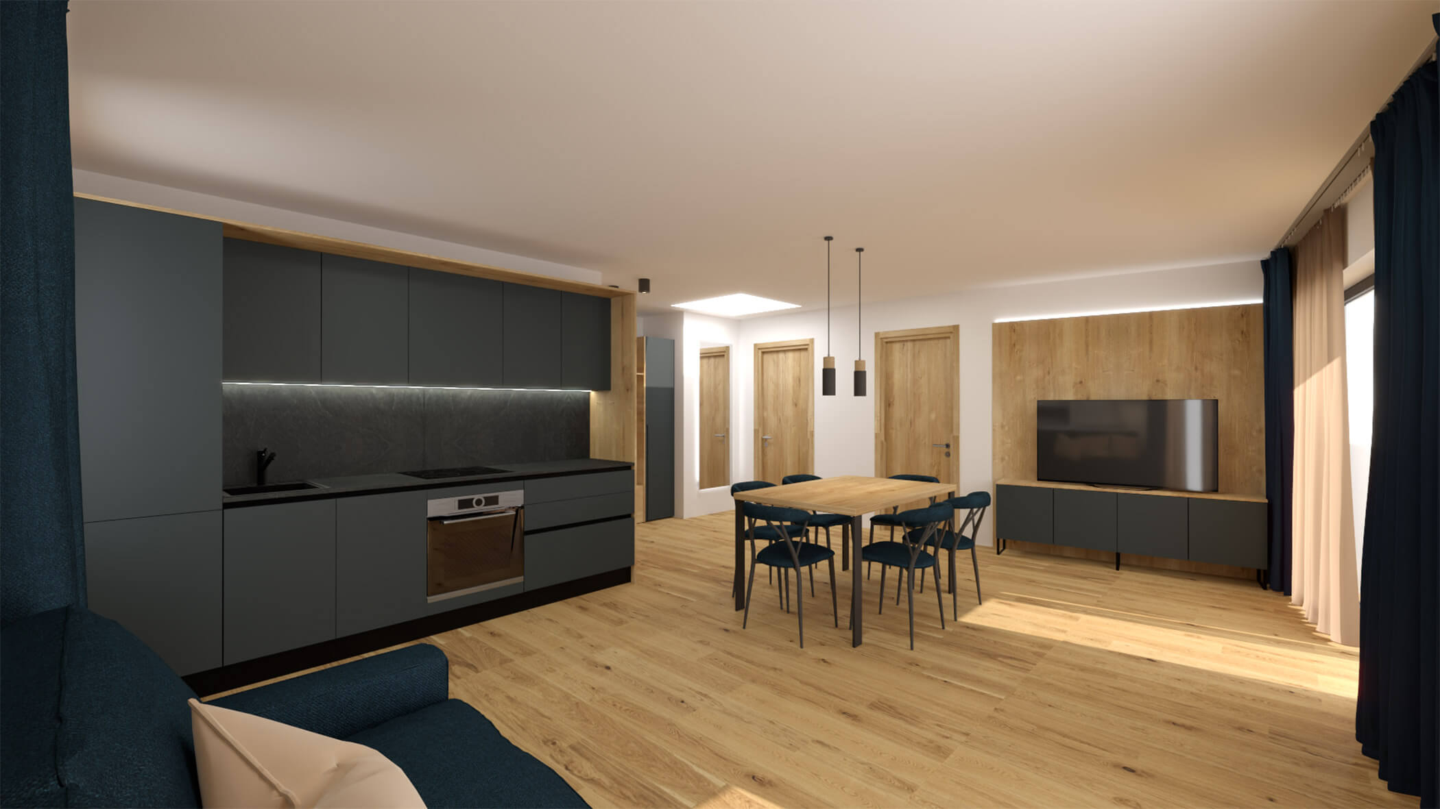 Wohnzimmer im Apartment 7 mit einem Holztisch und Stühlen in der Mitte des Raumes, links eine dunkelgraue Kochnische und im Hintergrund ein Fernseher - sil132 apartments